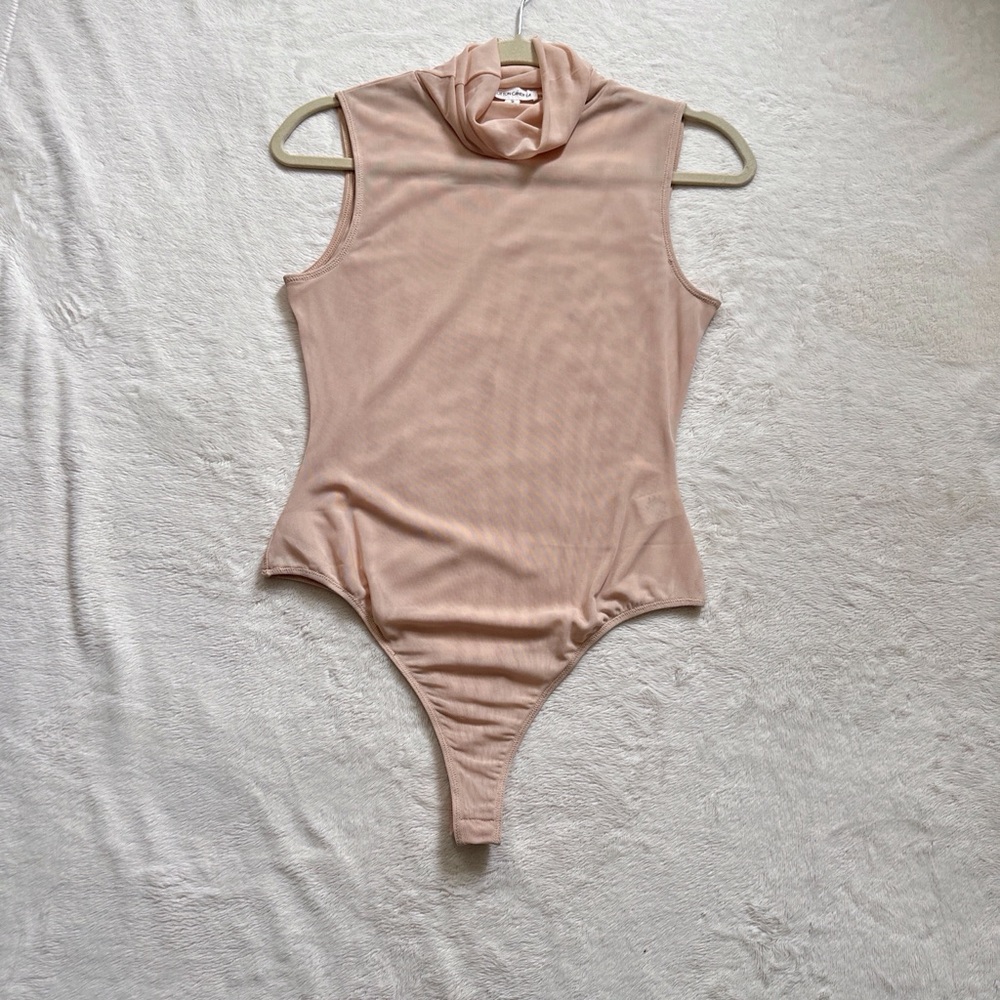 Cotton Candy Sleeveless Turtleneck Bodysuit in Blush Pink